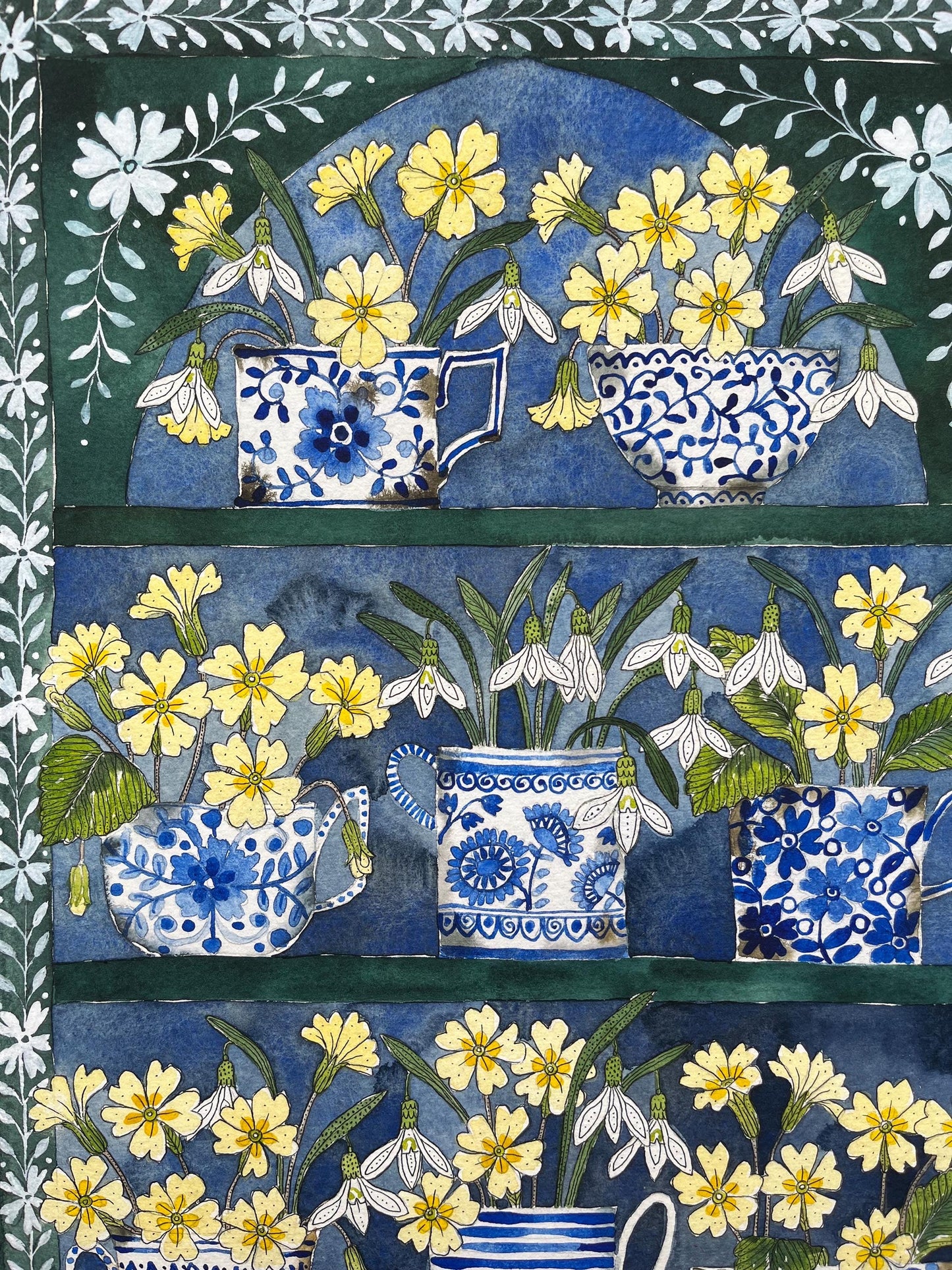 A3, limited edition giclee print of a watercolour and ink Snowdrops and primroses in delftware, ceramic mugs displayed in a plant Theatre.