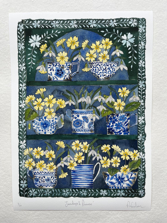 A3, limited edition giclee print of a watercolour and ink Snowdrops and primroses in delftware, ceramic mugs displayed in a plant Theatre.